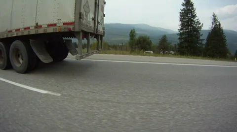 POV fisheye shot, transport truck on highway drive along Stock Footage