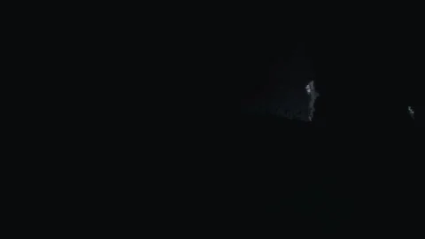 POV flashligth in a castle ruin almost like a cave. Video stock 299892079
