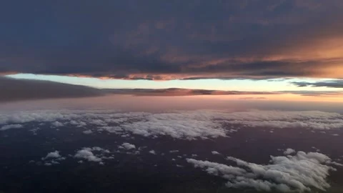 POV Flying Between Layers of Ethereal Stratus Clouds Illuminated by the Sunsise Stock Footage 335027941