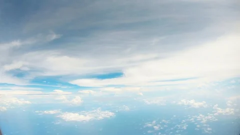 POV flying bird fantastical pattern of white clouds in blue sky under ocean 스톡 동영상 105263182