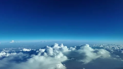 POV Flying in the Stratosphere Over Storm Clouds with a Curved Horizon: A Jet Stock Footage 345735473