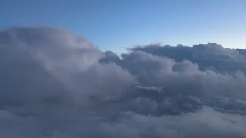 POV Flying through a Dramatic Cold Winter Sky at Sunset: an Immersive Pilot’s Stock Footage 300604890