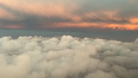 POV flying through a golden color early morning sky at sunrise. Aerial shot Stock Footage 293117053
