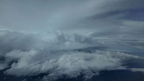 POV Flying Through a Stormy Sky Full of Threatening Storm Clouds Ahead. An Stock Footage 307575257