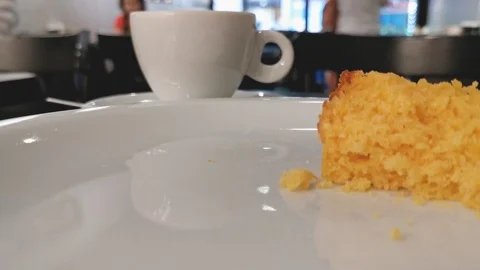 POV. Fork picks corn cake in close up. Selective focus, blurred background. Stock Footage 127162880