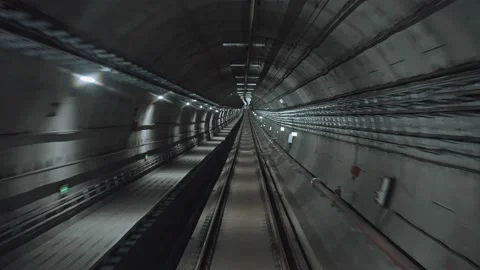 POV Forward view from a train travelling through a tunnel at high speed Video stock 232000210
