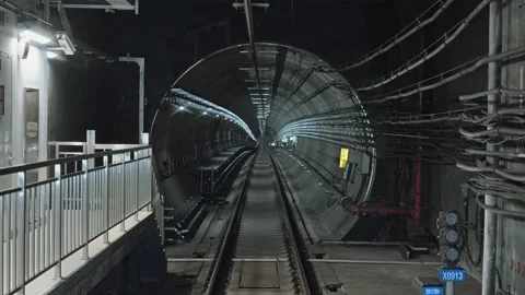 POV Forward view from a train travelling through a tunnel at high speed Stock Footage 232000554