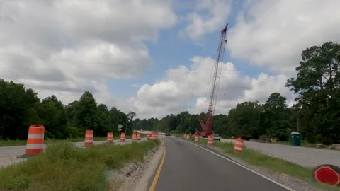 POV FPV driving cloudy sky bridge construction zone Hwy 1 Stock-Footage 204948902