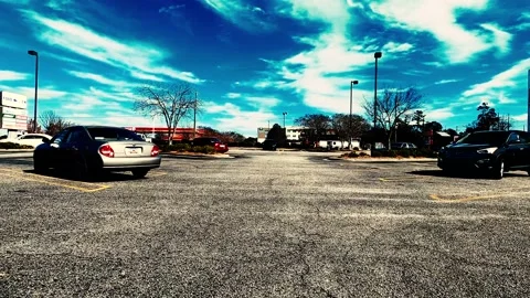 POV FPV driving through a parking lot full of cars Cinespace look Stock Footage 148127328