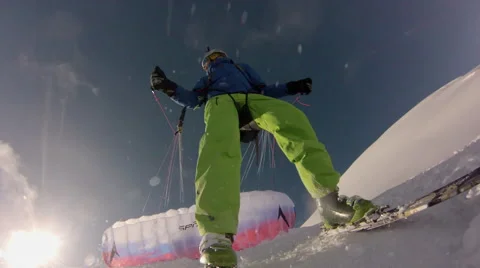 POV from front of ski of man soaring through the air as he goes speed riding fly Stock Footage 68497765