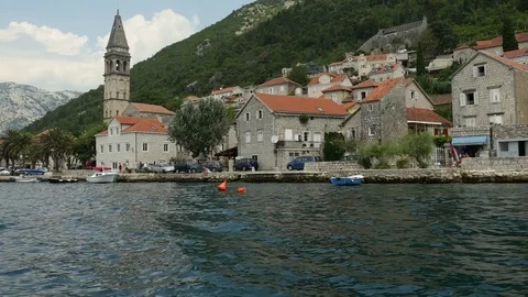 POV Front view of a boat moving along Perast city in Kotor bay, Montenegro Vidéo 79883232