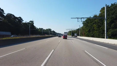 POV on german Electric Freeway - overhead wires over Autobahn for Trucks Stock Footage 118389101