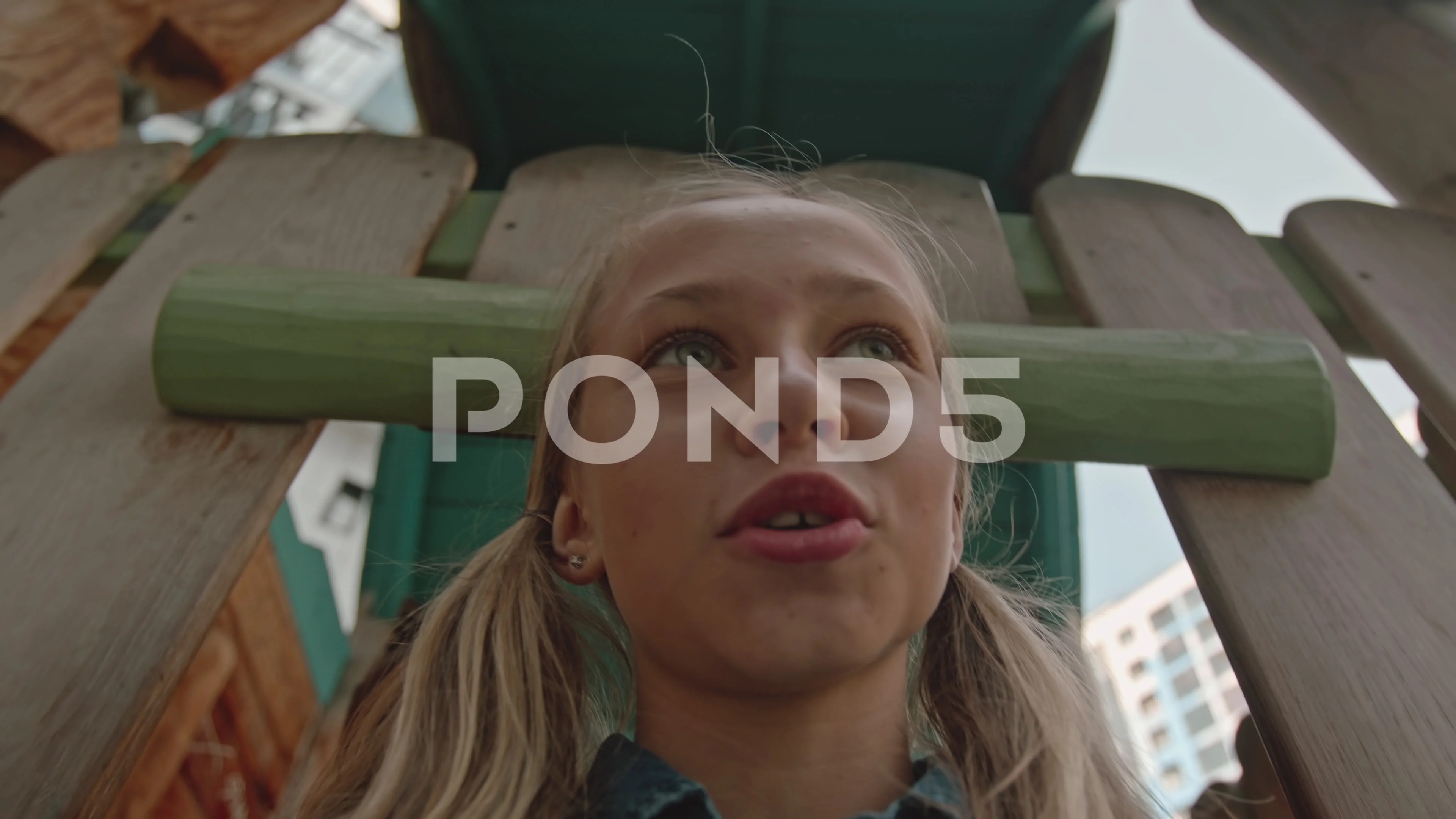 POV of Girl Going Down Slide at Playground