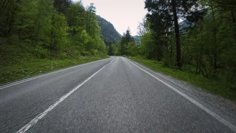POV Going Down An Empty Winding Mountain Road 库存影片 126167215
