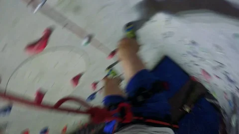 POV GoPro - a man ropes down on a training wall Stock Footage 79540608