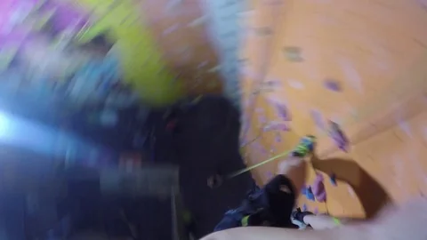 POV GoPro - a man ropes down on a training wall Stock Footage 79550945