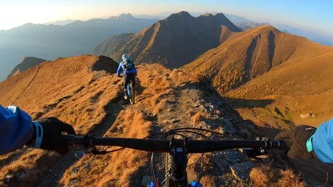 POV GoPro Sunset Mountain Biking in the Austrian Alps Stock Footage