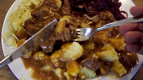 https://images.pond5.com/pov-goulash-potatoes-and-red-footage-094176322_iconl.jpeg