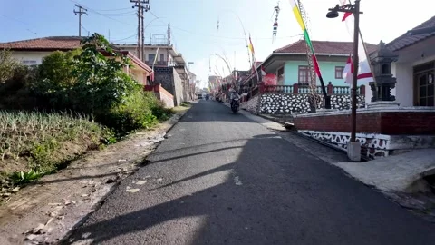 POV Ground Level Ascent Through Village Toward Bromo Stock Footage 345152050