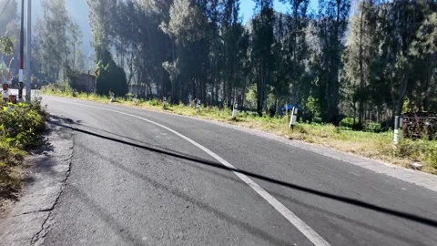POV Ground Level Drive Along Sukapura Mountain Road Vidéo 345140644