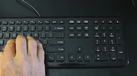 POV HANDS TYPING ON  KEYBOARD Stock Footage 22952534
