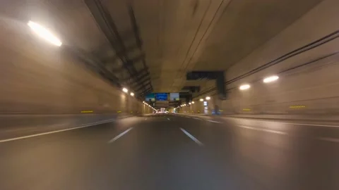 Pov hyper-lapse from car driving in the tunnel and Paris streets at night Stock Footage 171023414