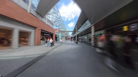 POV hyper lapse walking through Liverpool, UK outdoor shopping mall with people Stock Footage 316109921