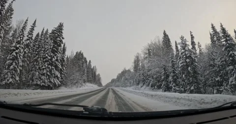POV Hyper Stabilized Travel through Snowy Winter Forest from inside Car Cabin on 库存影片 330956661