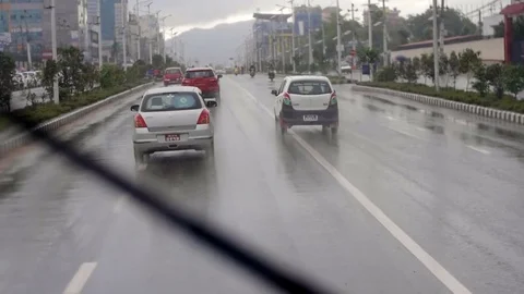 POV inside of bus with rain and traffic Video stock 76552416