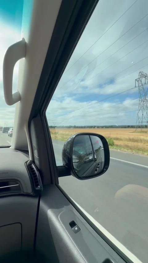 POV from inside a car driving on a highway on a road trip. Stock Footage 346637634