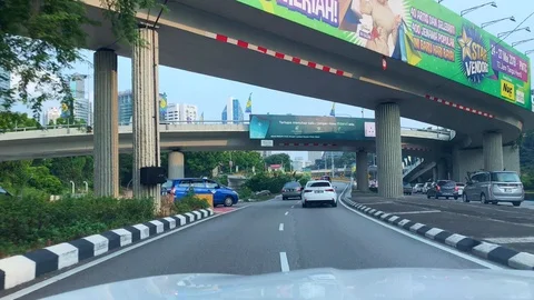POV from inside car of traffic going into the city. Video stock 111574745