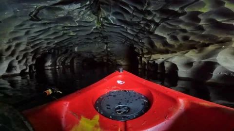 POV Inside a Cave system Stock Footage 243593920