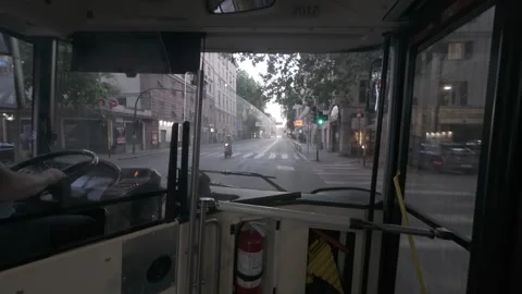 POV from inside city bus moving through urban street, Genoa, Italy. July 2, 2026 動画素材 338287109