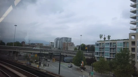 POV from inside moving sky train in city center of Vancouver,Canada Stock Footage 119317295