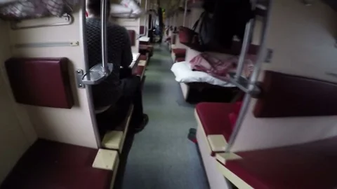 POV inside railroad empty sleeper car for poor, pass coupe, travel by passenger 動画素材 84660647