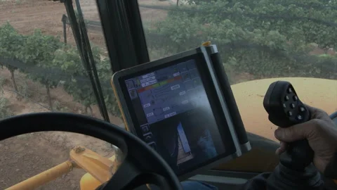 POV inside tractor coming to the end of the row in vineyard, 4K. Stock Footage 257950371
