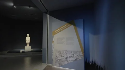 POV of inside Urfa Museum in Turkey to reveal the Urfa Man statue Stock Footage 202540683