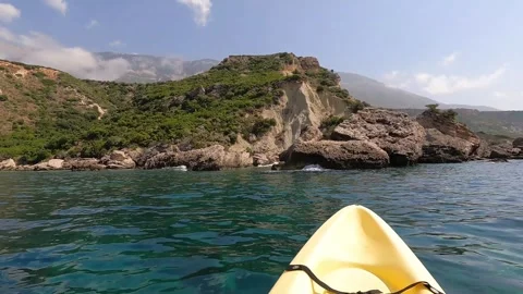 POV Kayaking Along the Clear Waters of North Kefalonia Greece Stock Footage 345206899