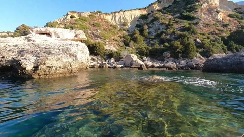POV Kayaking Through the Clear Ionian Sea Waters of Kefalonia Greece Stock Footage 345545675