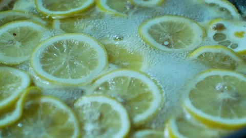 POV to the lemon sliced in boiling sugar for making lemonade Video stock 166229029