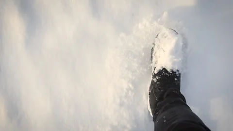 POV looking down feet walking in the snow Stock Footage 146802566
