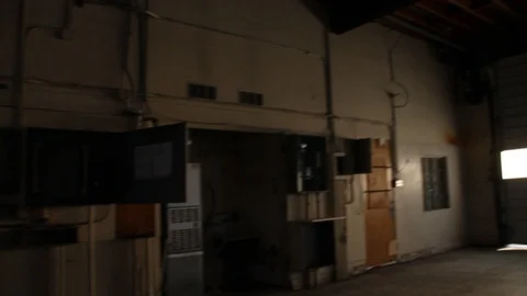 POV looking up in empty dark garage Stock Footage 95112000
