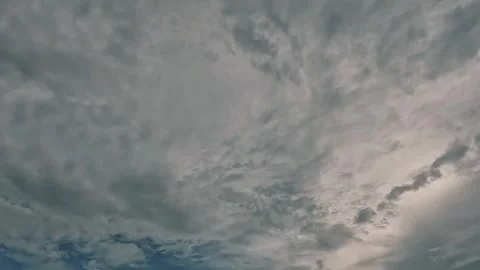 POV Looking up at lovely cloud pattern late afternoon Stock Footage 296733111