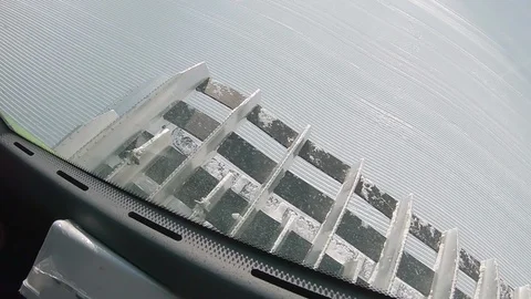 POV looking out the window of snow grooming machine. Stock Footage 99808164