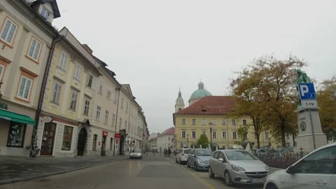 POV looking for parking in old downtown Ljubljana, Slovenia Stock Footage 166032267