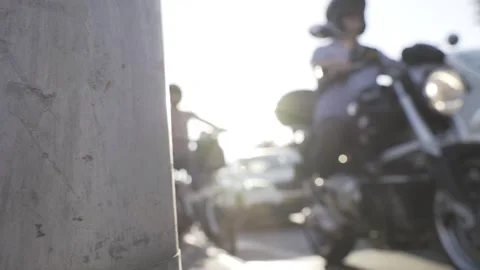 POV Low angle panning shot from sidewalk to road crossing. Downtown street view Stock Footage 144926427