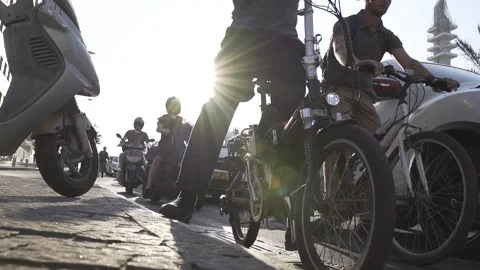 POV Low angle panning shot from sidewalk to road crossing. Downtown street view Stock Footage 144926655