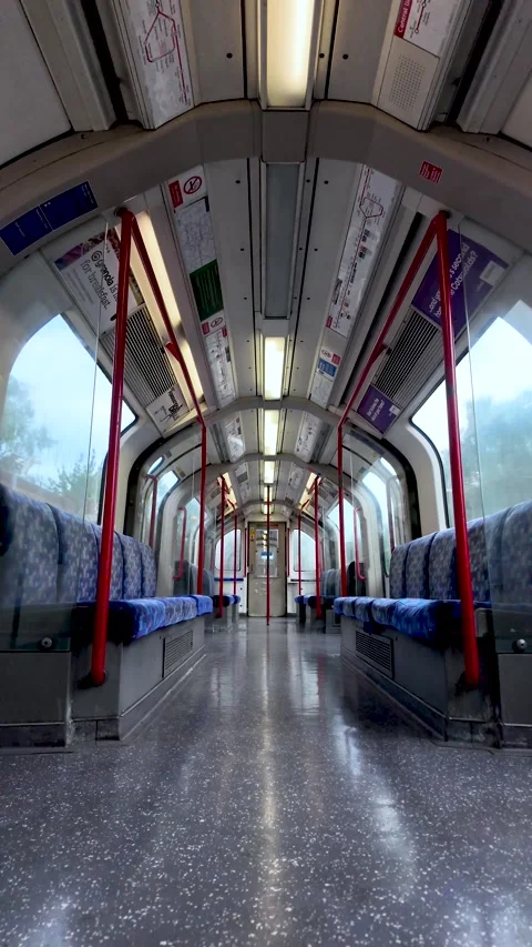 Pov low angle view inside an empty Central Line train carriage in motion on the Stock Footage 338029632