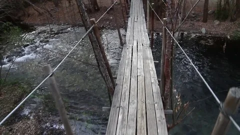 POV man crossing bridge Video stock 77044819