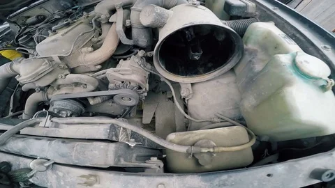 POV Man fumbling with the old machine in the engine compartment. Stock Footage